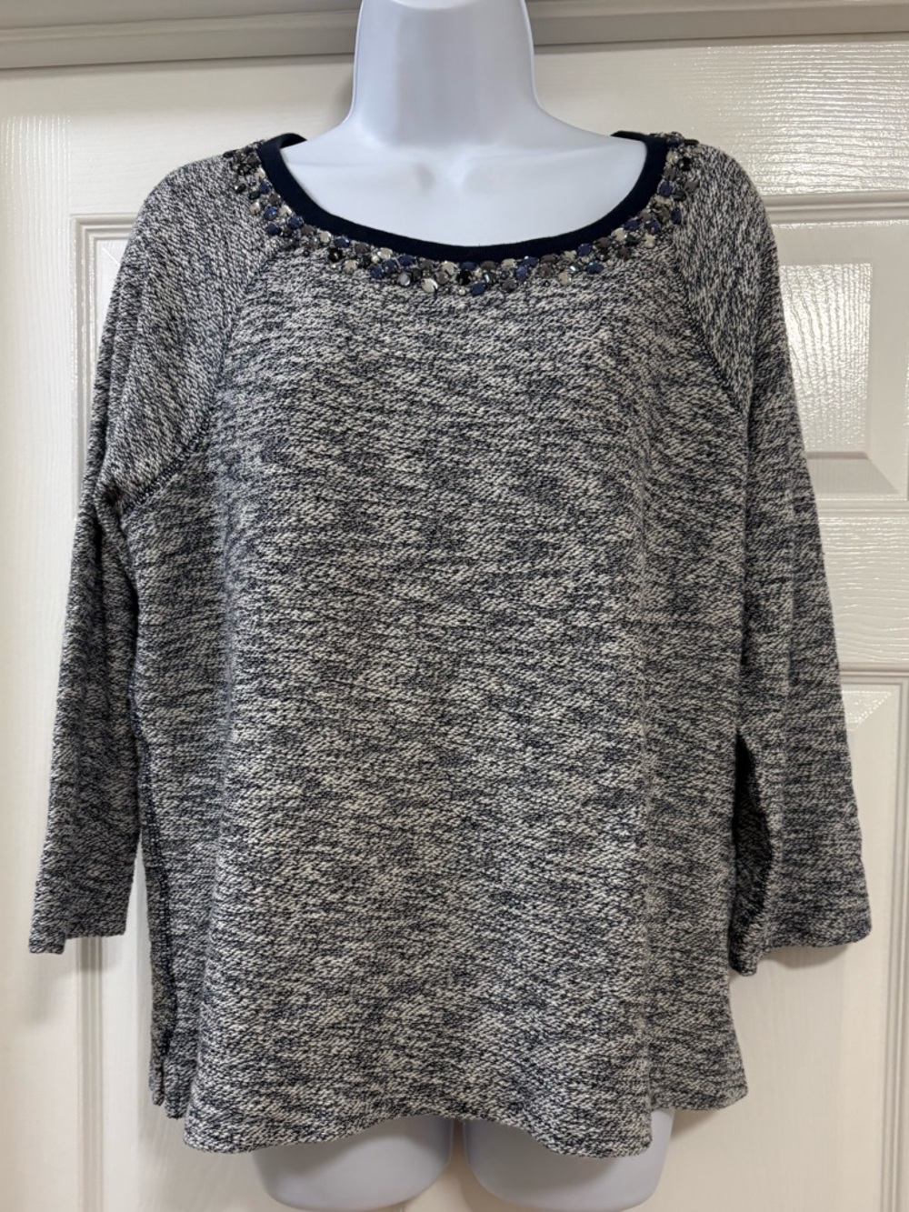 Lands' End pullover sweater features a beaded neckline and a marled design.